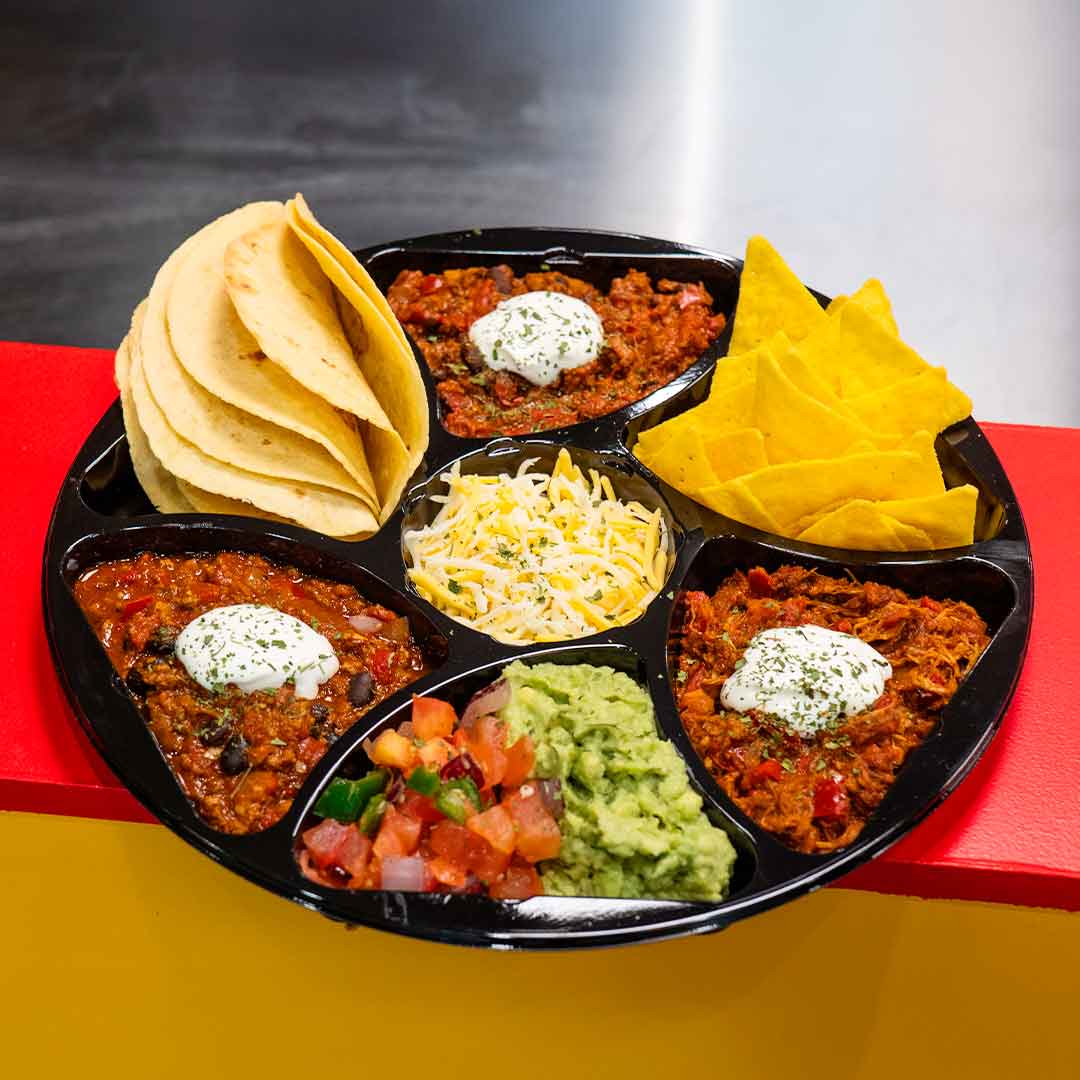 El Santos signaturret: taco plate med sprøde tacos, friske toppings og masser af smag – perfekt til street food-elskeren.